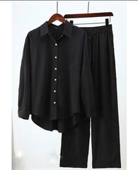 Black button down shirt with black flapper trouser