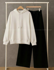 Plain white hoodie with black wide leg jeans