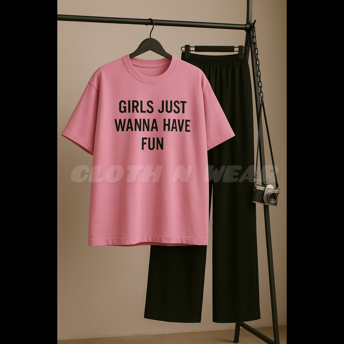 Pink T-shirt (girls just wanna have fun) print with black flapper trouser